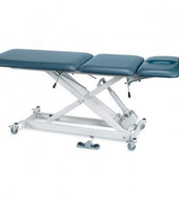 Tri W-G Treatment Table, Motorized Hi-Lo SX 3 section, fixed center, 27" x 76", w/ casters