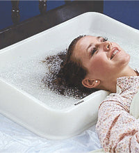 Inflatable shampoo basin