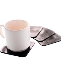 Dycem non-slip square coasters, set of 4, silver